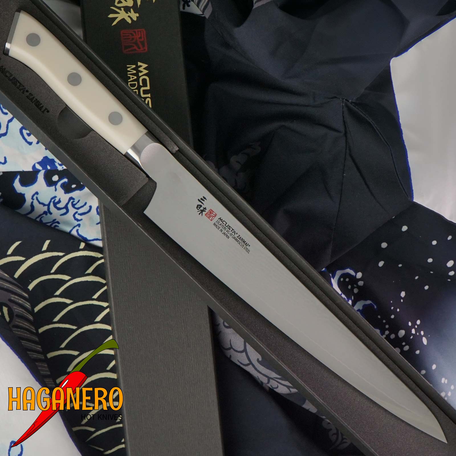 Sujihiki Japanese kitchen knife Mcusta Zanmai Classic Damascus SPG5 HKC-3010D 24cm