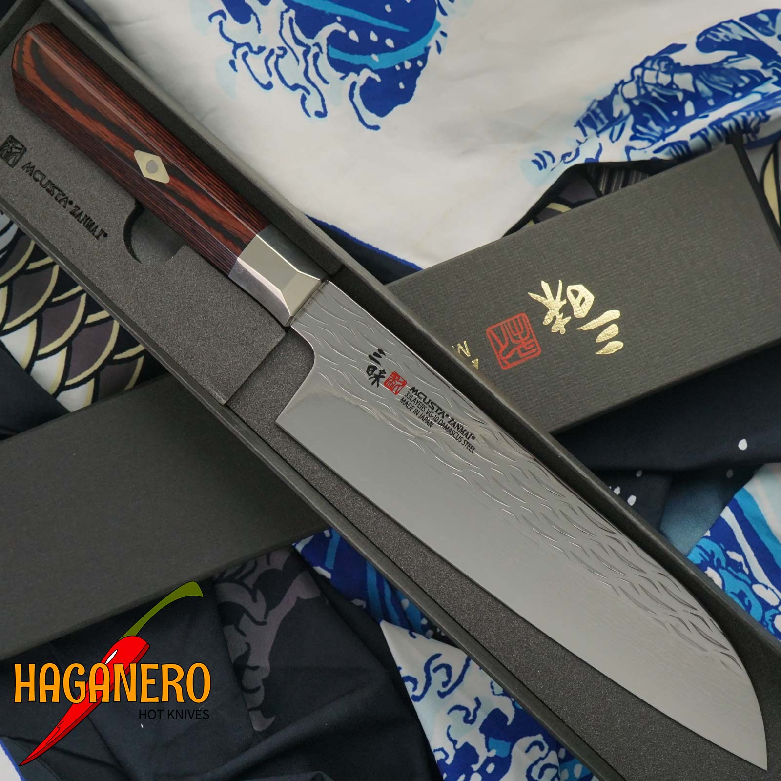 Santoku Japanese kitchen knife Mcusta Zanmai Supreme Ripple Damascus TZ2-4003DR 18cm
