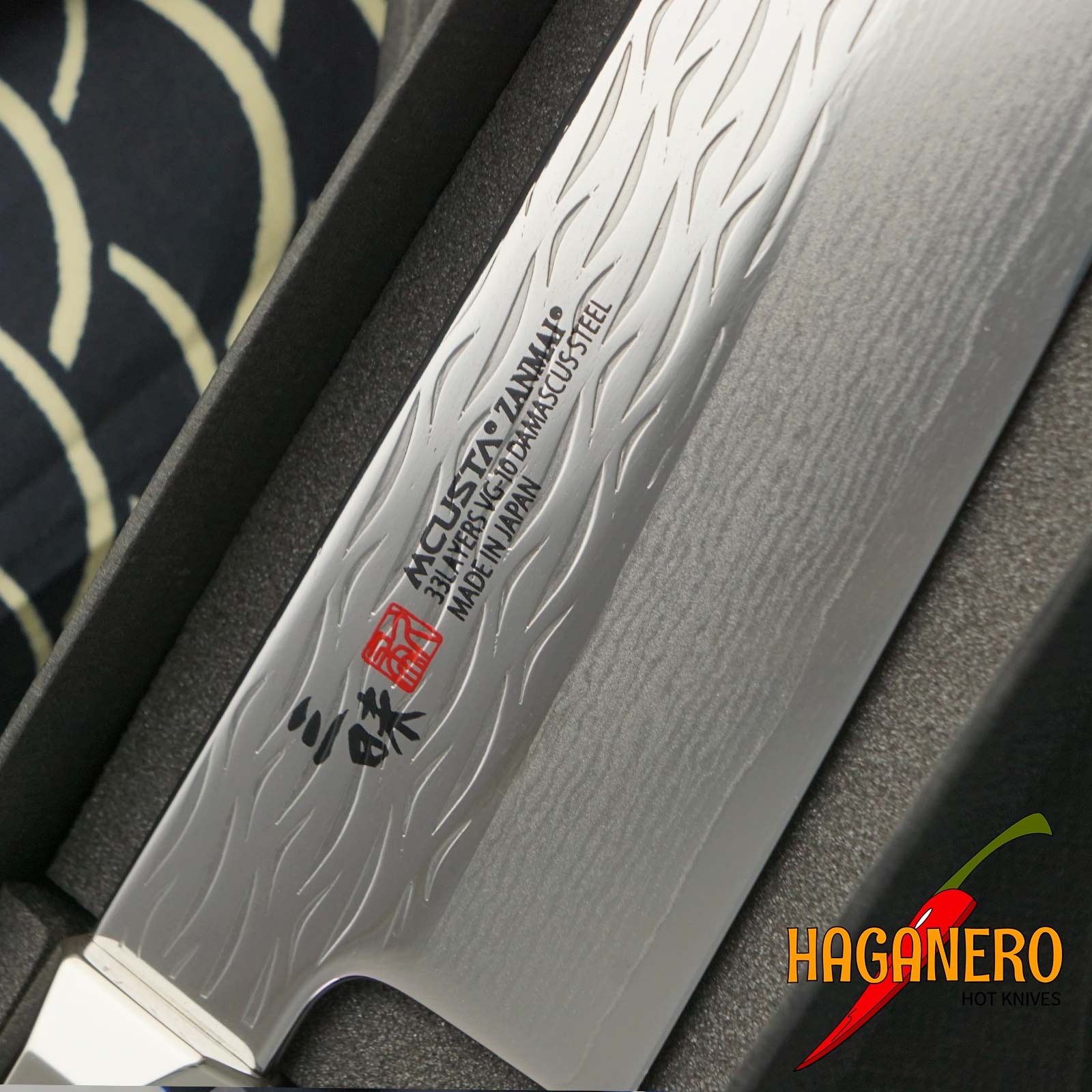 Gyuto Japanese kitchen knife Mcusta Zanmai Supreme Ripple Damascus TZ2-4005DR 21cm