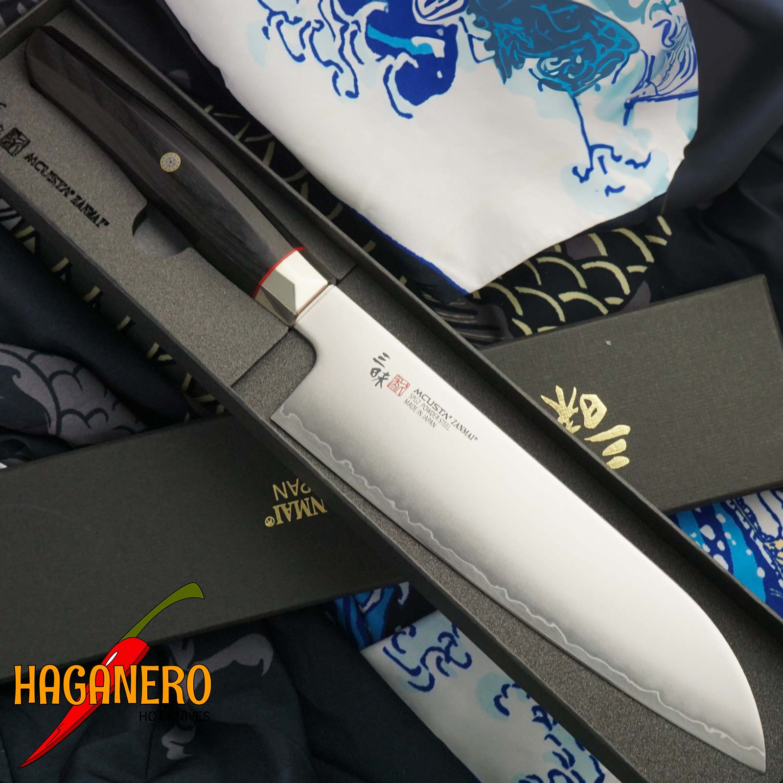 Santoku Japanese kitchen knife Mcusta Zanmai Revolution SPG2 ZRB-1203G 18cm