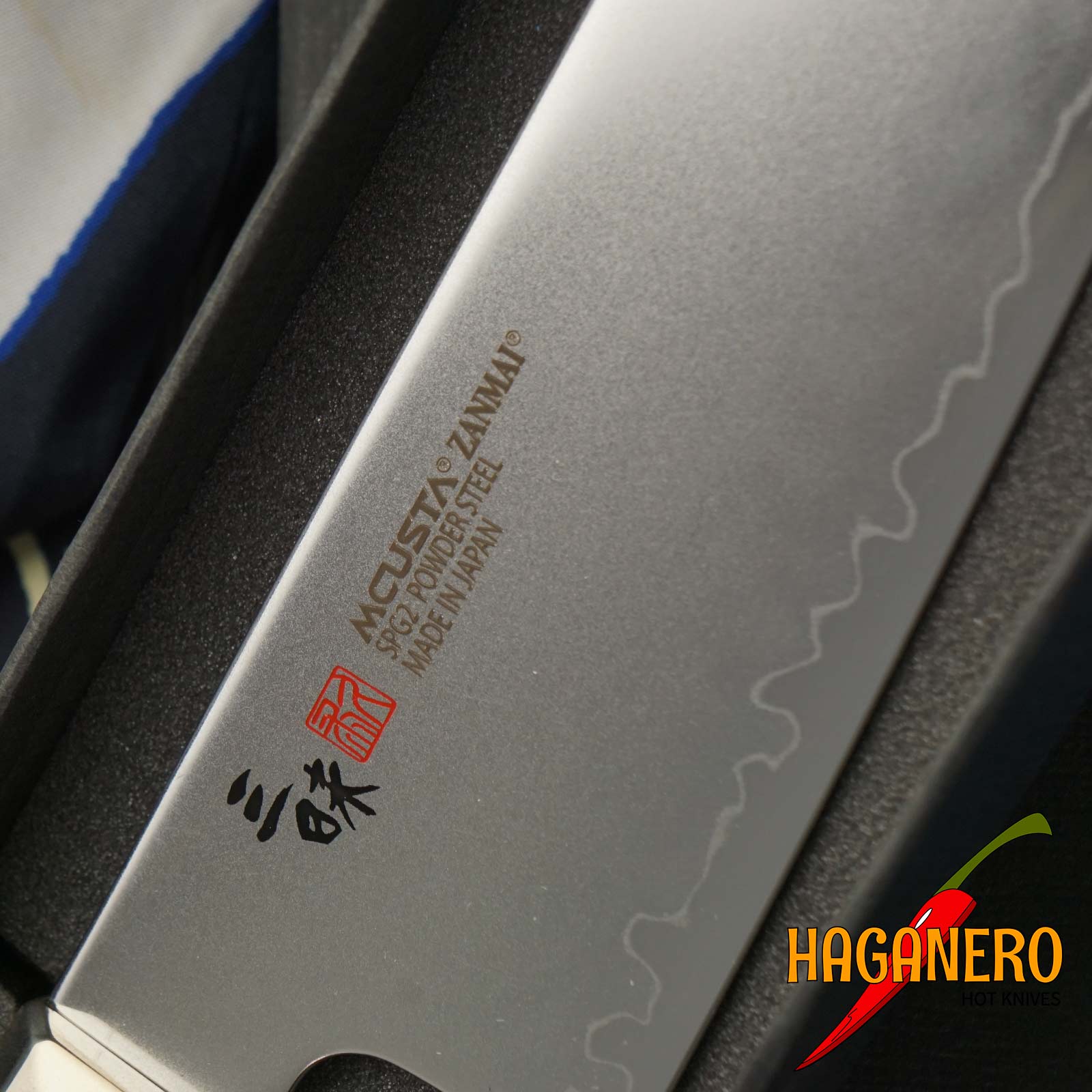Santoku Japanese kitchen knife Mcusta Zanmai Revolution ZRB-1215G 15cm